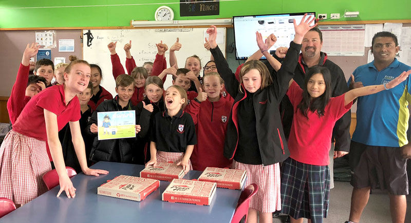 Everyone was happy when CrestClean business owner Krishna Kumar turned up with pizza for the winning class at Ashburton Borough School.