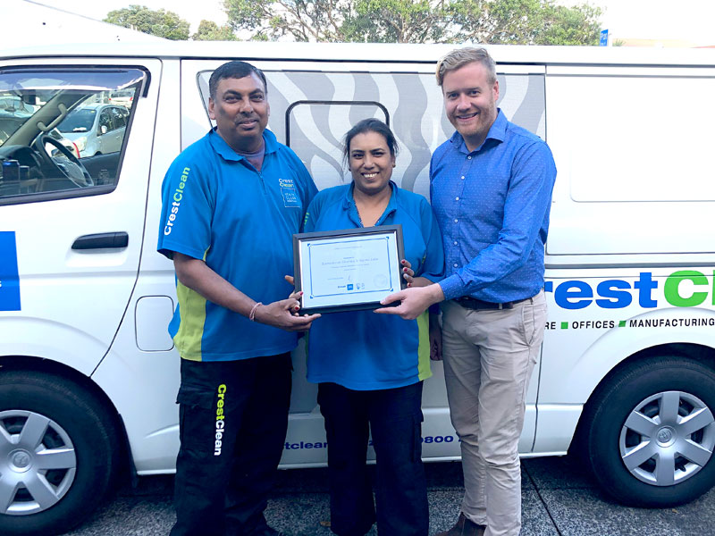 Rameshwar Sharma and Rasmi Kiran Lata receive their long service certificate from Damon Johnson, CrestClean’s Assistant Franchise Manager.  