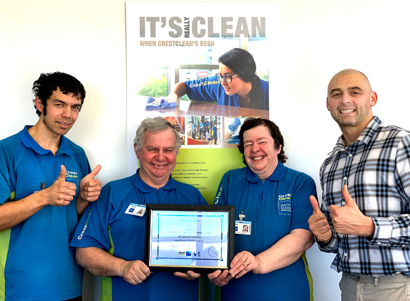Steve Kannewischer with his wife Lynne and stepson Sam Larkins are celebrating seven years with CrestClean. Also pictured is Tony Kramers, CrestClean's Dunedin Regional Manager.